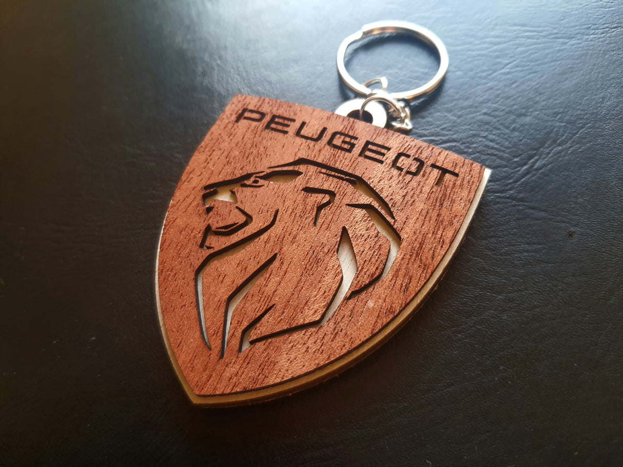 Elegant Peugeot nøglering i Birketræ og Mahogni
