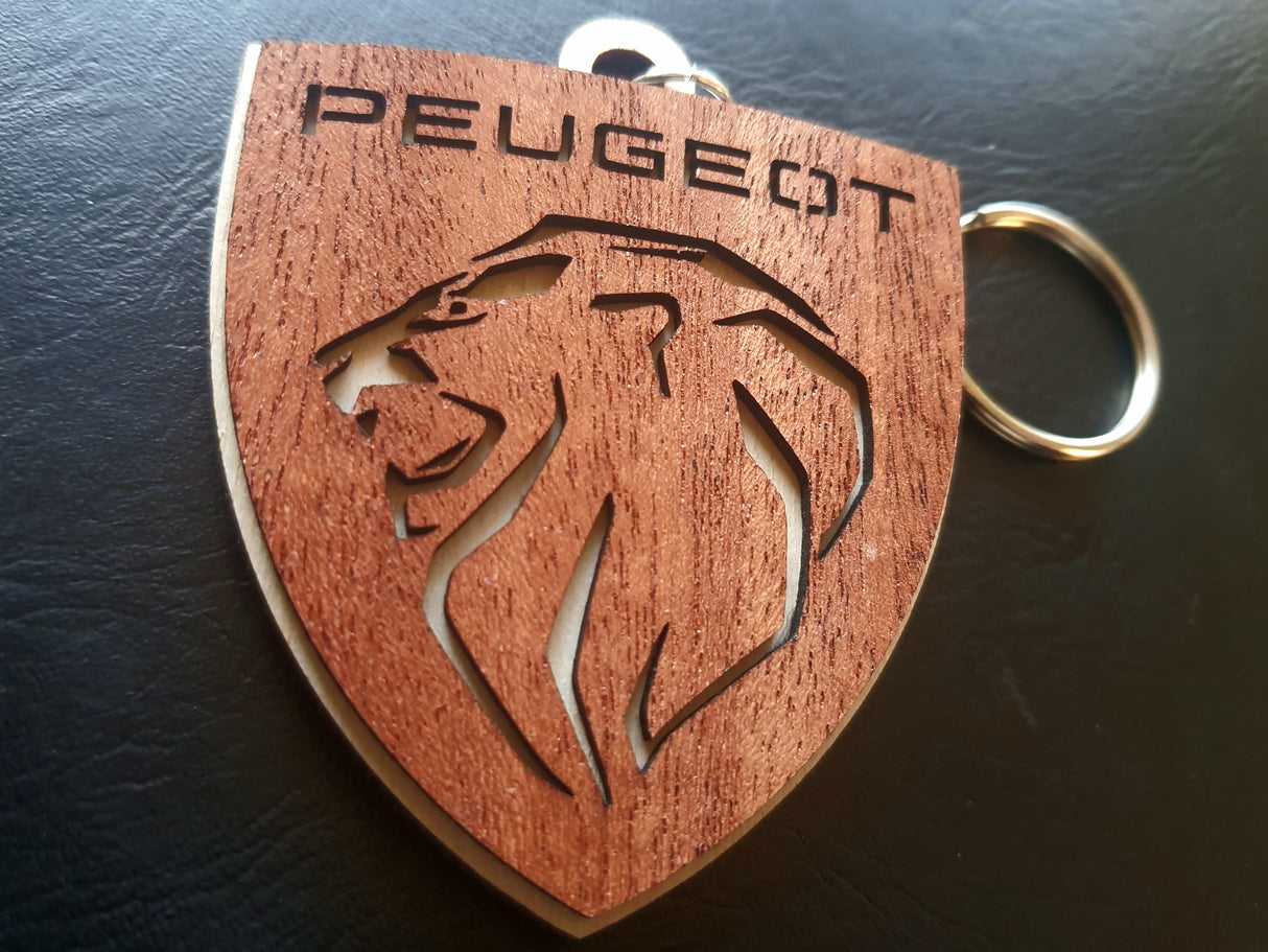 Elegant Peugeot nøglering i Birketræ og Mahogni
