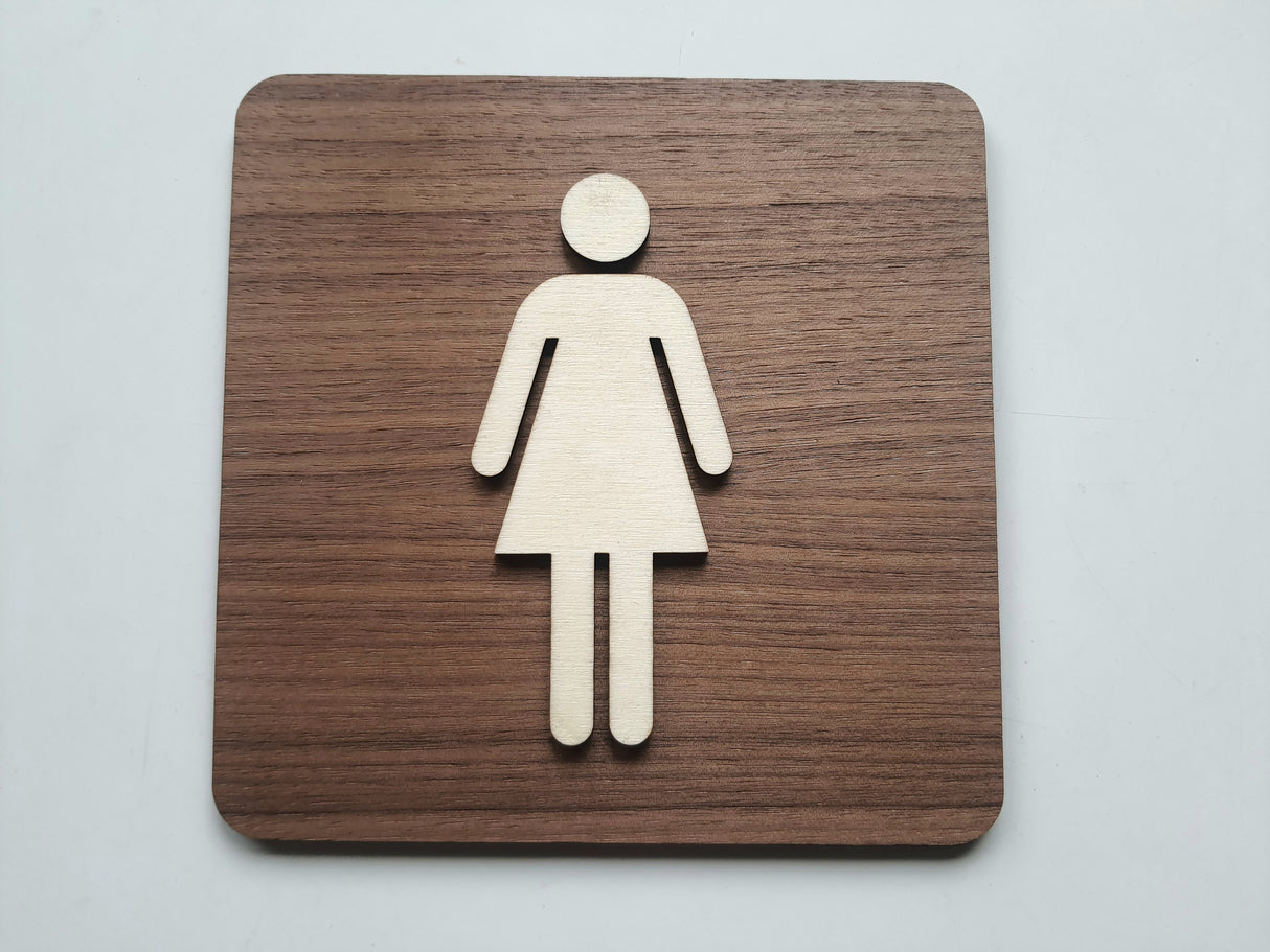 Dametoilet skilt set forfra i træ