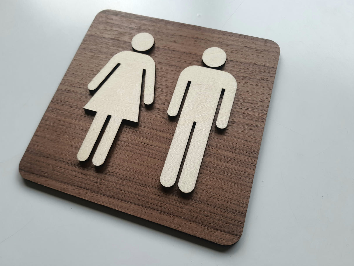 Toiletskilt i træ med nordisk design – piktogram af mand og dame
